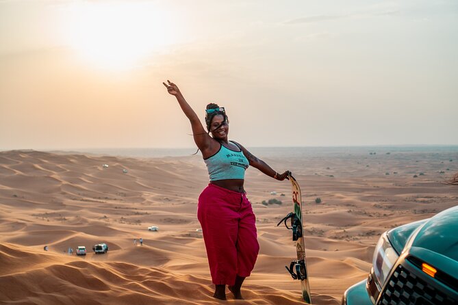 Premium Red Dune Safari with Camel Ride and BBQ in Arabian camp - Dune bashing across Lahbab’s red sand