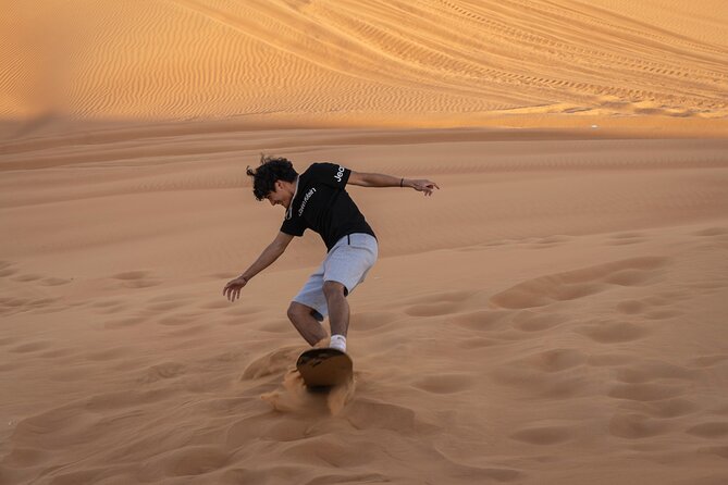 Premium Red Dunes Bashing with Quad Bike, Camel, Falcon &VIP Camp - Forty-five minutes of dune bashing