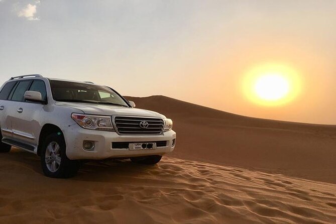 Premium Sundowner Red Dunes & Camel Safari with BBQ Dinner - Booking, pickup, and cancellation details