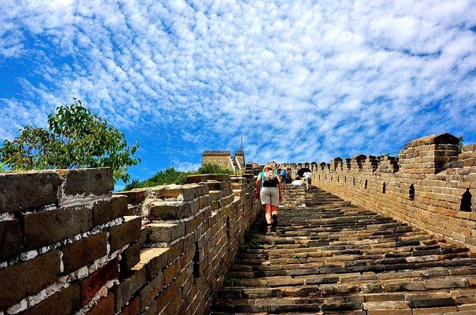 Private Day Tour of Mutianyu/Badaling Great Wall w/VIP Fast Pass - Mutianyu, mountain views, and the toboggan option
