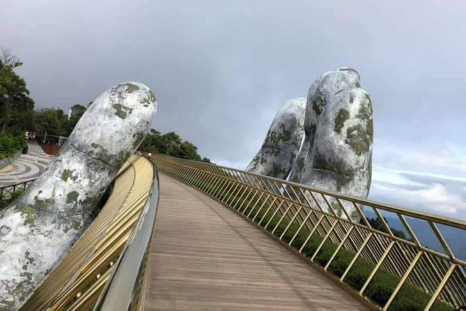 Private luxury Ba Na Hills & Hoi An Walking Tour, Night Market - Riding up to the Golden Hands Bridge