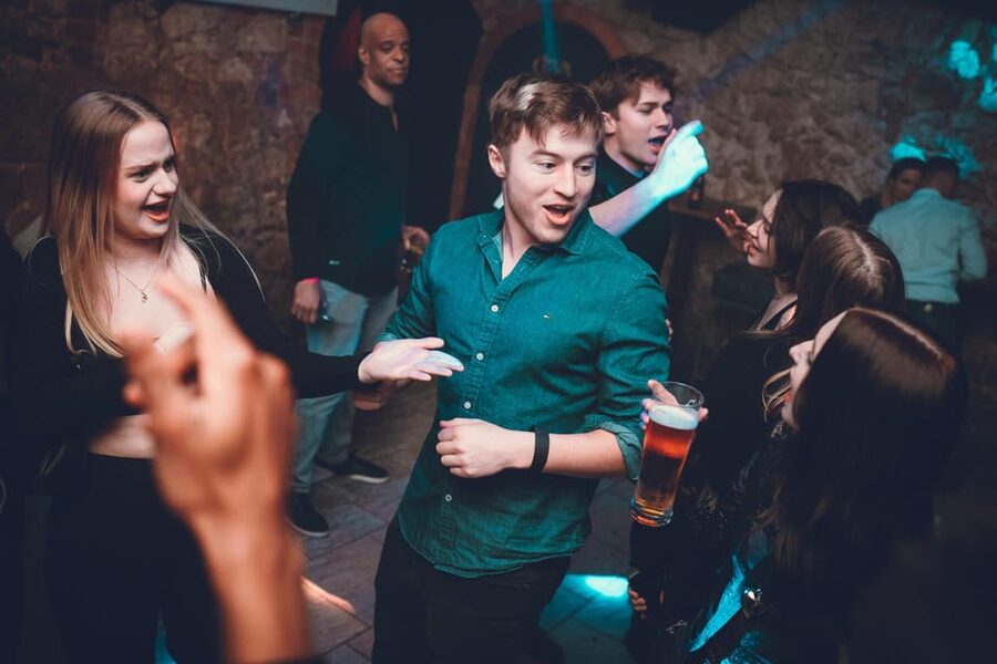 Pub Crawl - 1-hour Open Bar then Vip to 5 Clubs - Krakow - Moving through Krakow’s Old Town