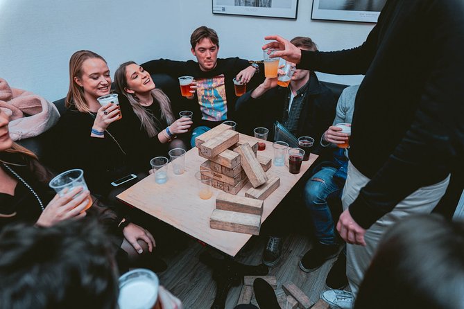 Pub Crawl + Unlimited Drinks + VIP entry + Drinking Games & Photographer - The first stop: one hour of drinks and group games