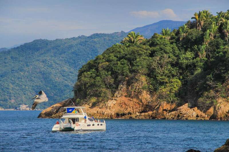 Puerto Vallarta: Luxury Yacht Tour with Lunch and Open Bar - Majahuitas Cove and its rainforest setting