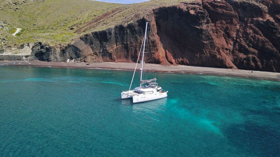 Santorini: Caldera Luxury Catamaran Cruise w/ Meal & Drinks - Nea Kameni brings volcanic water and a generous meal