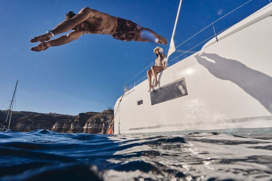 Santorini: Day Luxury Catamaran Cruise with Meal & Drinks - Lunch is more than a plate of grilled meat
