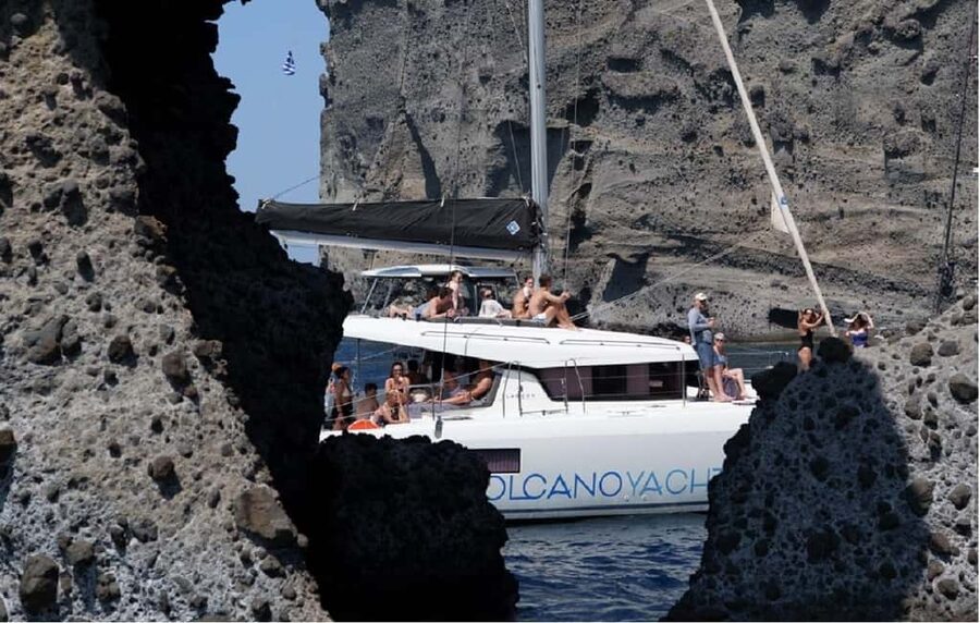 Santorini: Luxury Caldera Cruise With Meal & Drinks - The caldera cliffs from the water