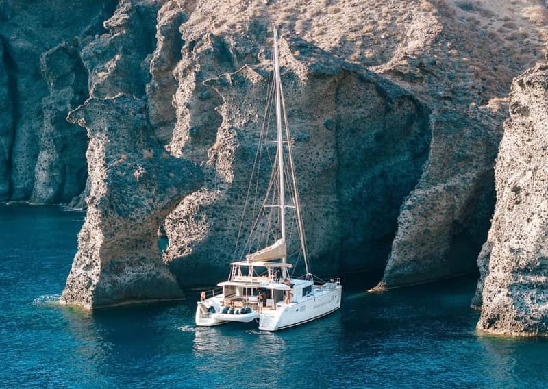 Santorini: Luxury Catamaran Cruise with Lunch, BBQ & Drinks - Red Beach and the southern coast