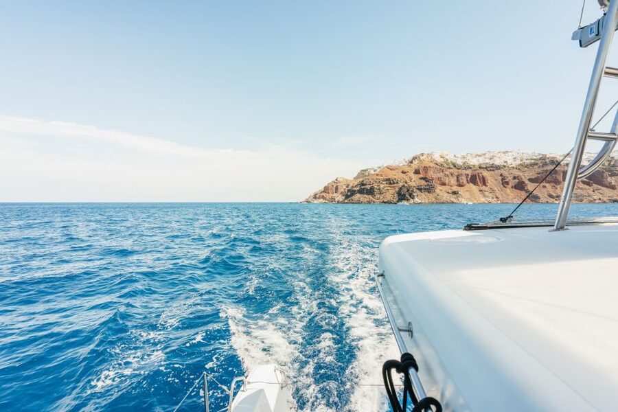 Santorini: Luxury Catamaran Day Trip with Meal and Open Bar - Greek food served on the catamaran