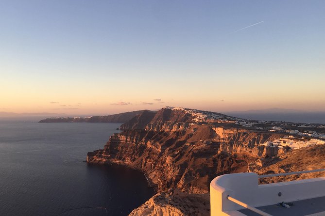 Santorini Luxury Custom Private Tour with Local guide - Oia: white houses, blue domes, and a crowded path