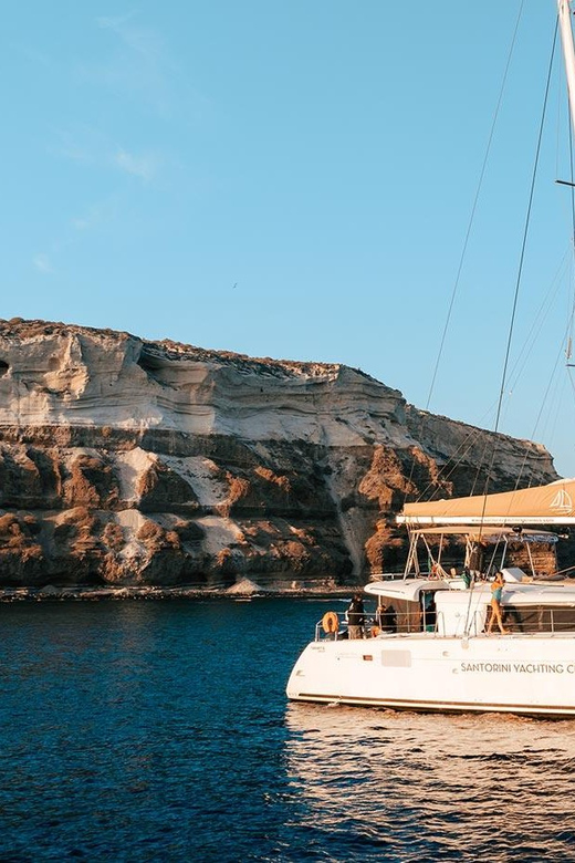 Santorini: Luxury Sunset Cruise with Dinner, BBQ, and Drinks - Entering the caldera and the Palea Kameni hot springs