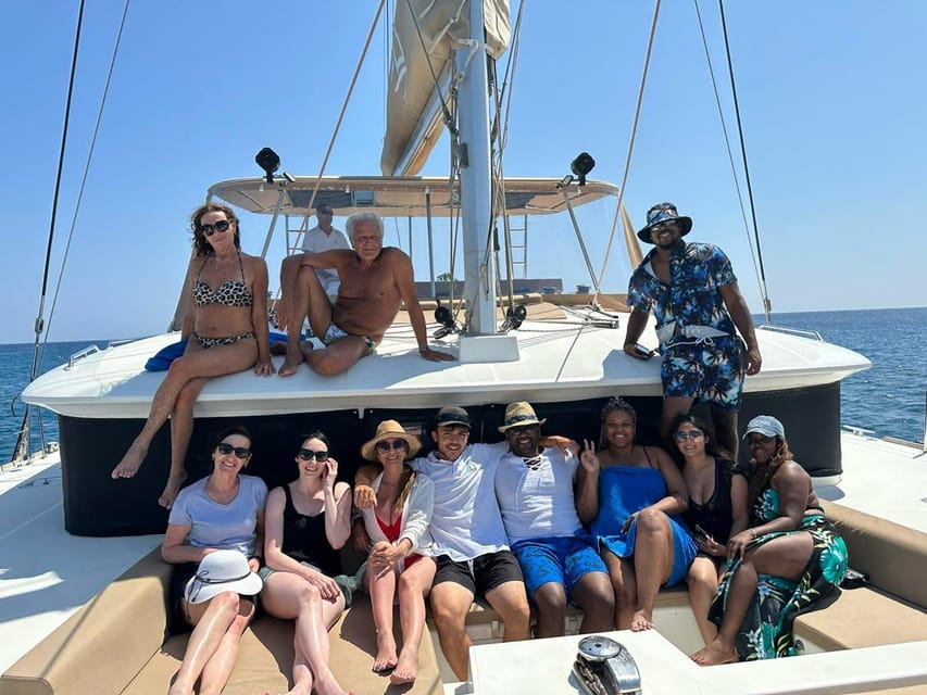 Santorini: Luxury Sunset Cruise with Dinner, BBQ, and Drinks - Crew service and comfort at sea
