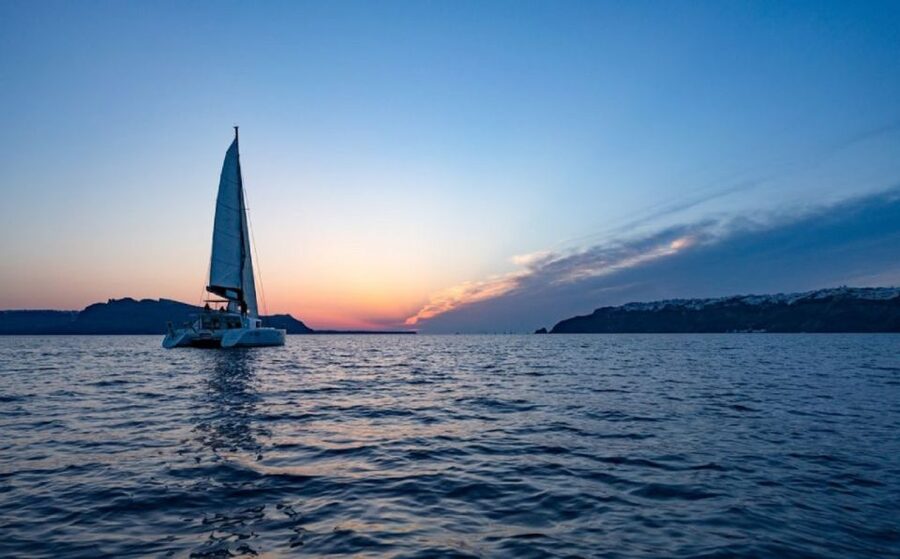 Santorini: Luxury Sunset Cruise with Dinner & Open Bar - Leaving Ammoudi Port for the Caldera
