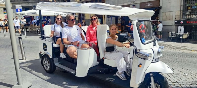"See Madrid Differently: A Premium Private Tuk Tuk Ride" - Starting near the Teatro Real and Plaza Mayor