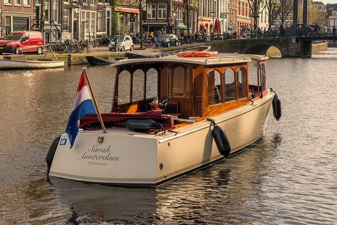 Small-Group Luxury Canal Cruise with Local Skipper - Passing the Anne Frank House by canal