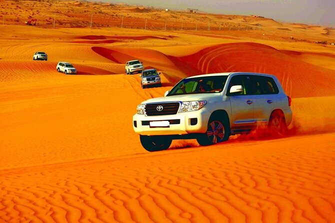Sunset Desert Safari | Premium BBQ Dinner | Red Sand Dune - Belly dancing, Tanoura, and the fire show