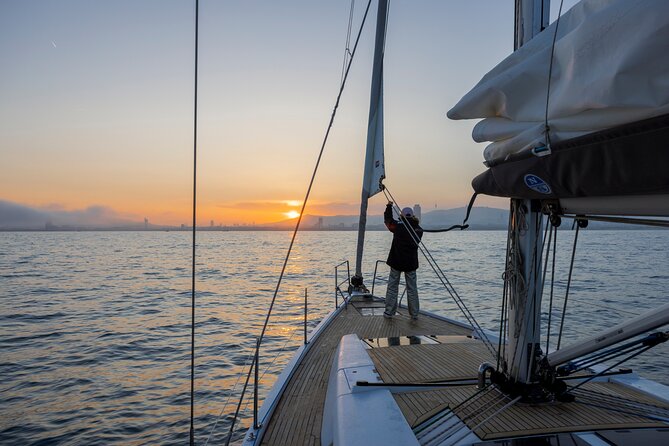 Sunset On A Luxury Sailboat From Port Olimpic - What Captain Christian adds to the evening