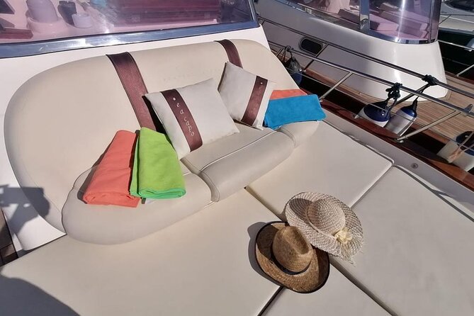 Three Hour Private Guided Tour of Capri with a luxury Gozzo cabin cruiser - White Grotto and the changing colors inside the rock