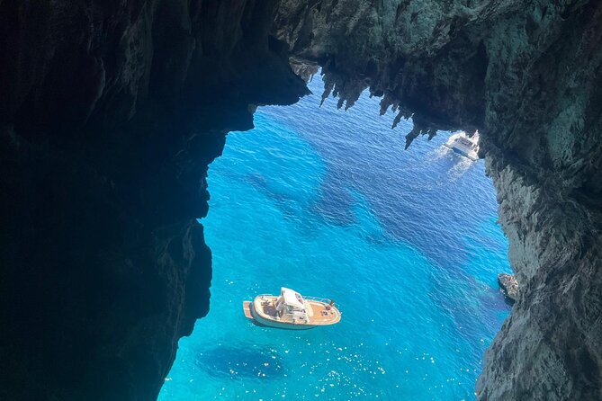 Three Hour Private Guided Tour of Capri with a luxury Gozzo cabin cruiser - Watchtowers, forts, and the western end of the island