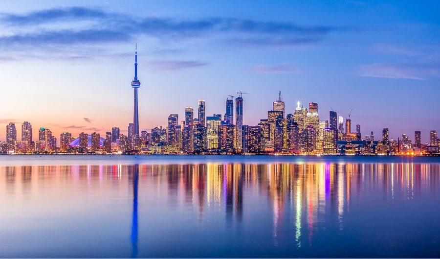 Toronto: Premium Night Driving Tour with Tower Entry - A guided walk through the Distillery District