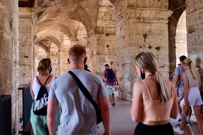 VIP Colosseum & Roman Forum Small Group Guided Tour - Walking through the Roman Forum