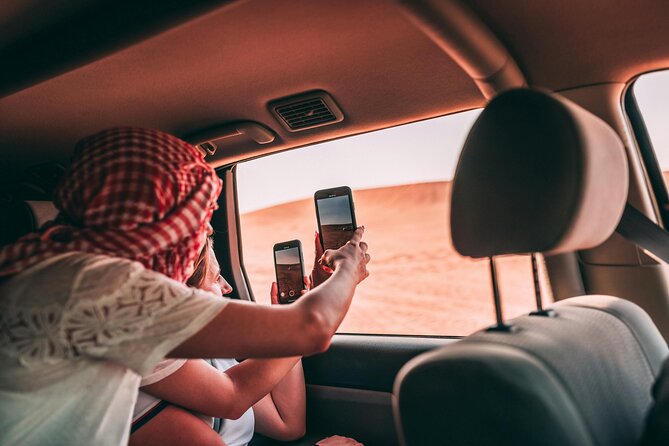 VIP Desert Safari Camel Ride Sand Boarding & BBQ Dinner - A 150-meter camel ride at sunset