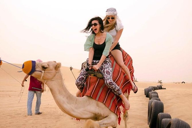 VIP Dubai Desert Safari with Dinner served at table and 3 live Shows - Sandboarding and the short camel ride