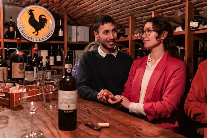 VIP Florence Dinner Tour: Truffle, Florentine Steak & Fine Wines - Wine through a centuries-old window at Cantina De’ Pucci