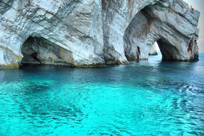 VIP Full Day Tour Shipwreck Blue Caves and top view - The boat changes the scale of Shipwreck Beach