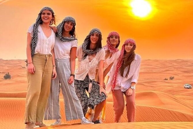 VIP Service | Red Dunes Sunset Desert Safari With BBQ Dinner - Sunset photos and sandboarding